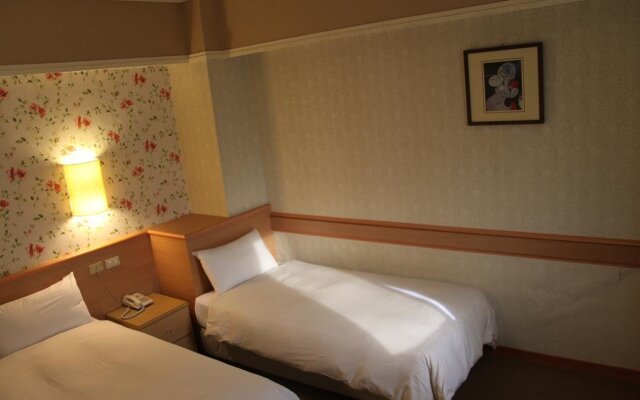 Manbo Holiday Hotel