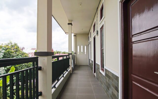 SPOT ON 92570 Putri Guest House Syariah Near SPBU Rimbo Panjang