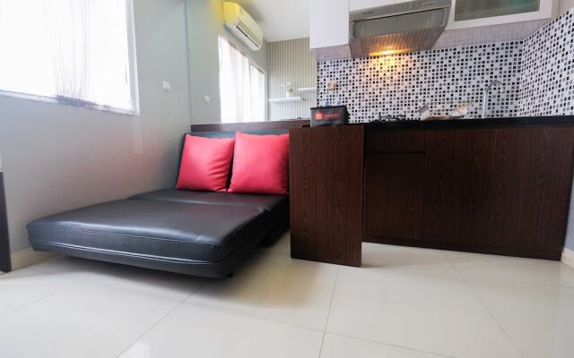 Homey and Relaxing 2BR Green Pramuka Apartment
