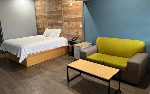Symphony Inn and Suites