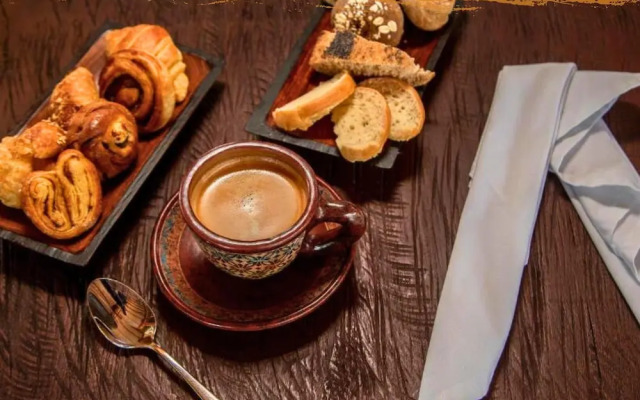 Tribe Inn & Rooftop Lounge