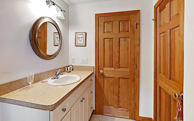 Woodsy Cape Cod Home by RedAwning