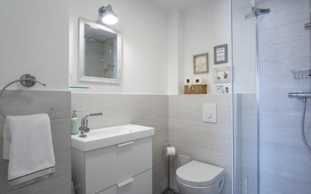 A White Cliffside Studio