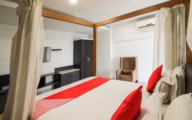 Capital O 15964 NI Ambaari Suites