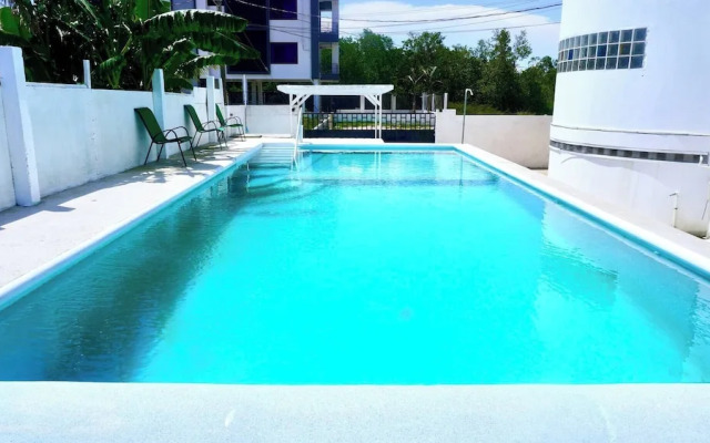 See Belize Waterside Sea View 2-bedroom Apartment w Balcony, Pool & Deck 2nd FL