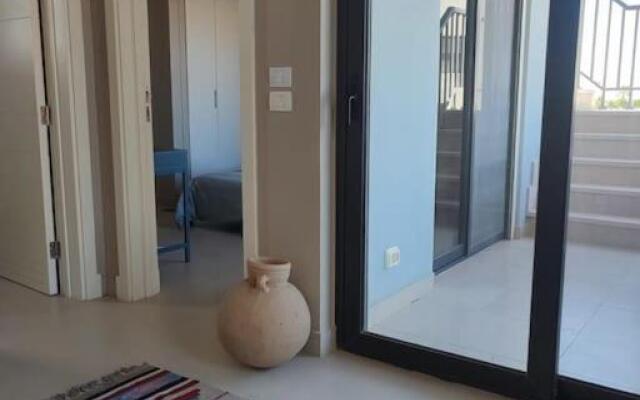 Tawila - Lovely 2-bedroom unit with shared pool