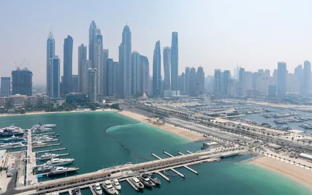 Modern 2BR Emaar Beachfront w Pvt Beach Access