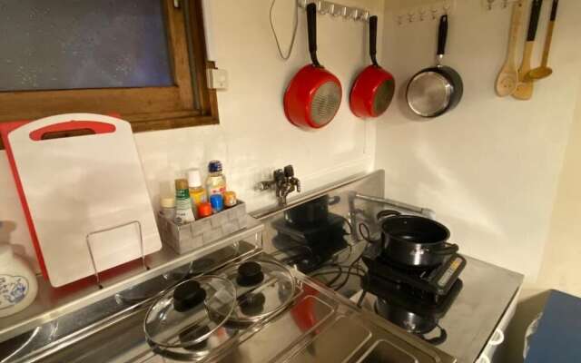 Sapporo Dome Front House