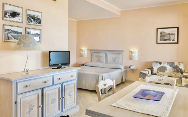 Residence with private beach in Bosa Marina