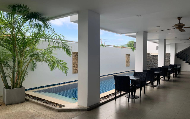 One World One Home Naiharn Hotel