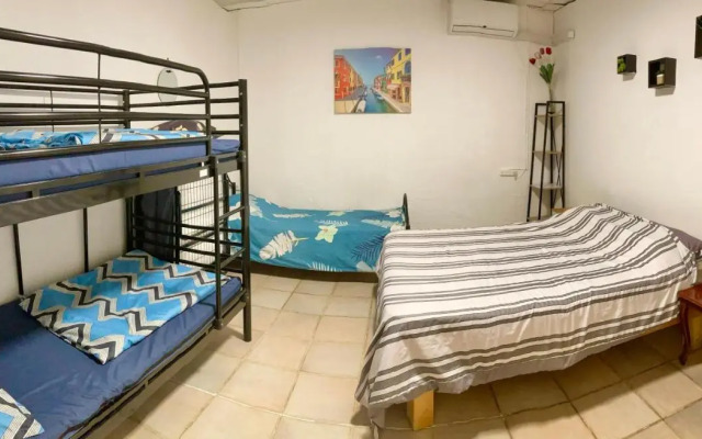 Low-Cost Guesthouse - By The Beach!