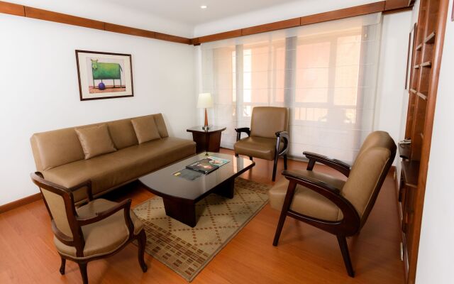 Travelers Suites Condominio Plenitud