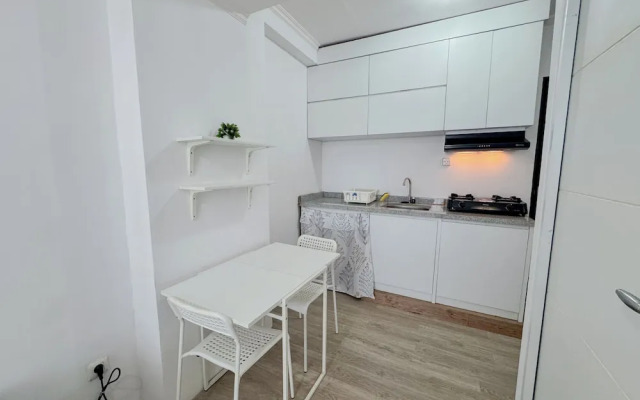Compact and Restful 2BR at Menara Rungkut Apartment