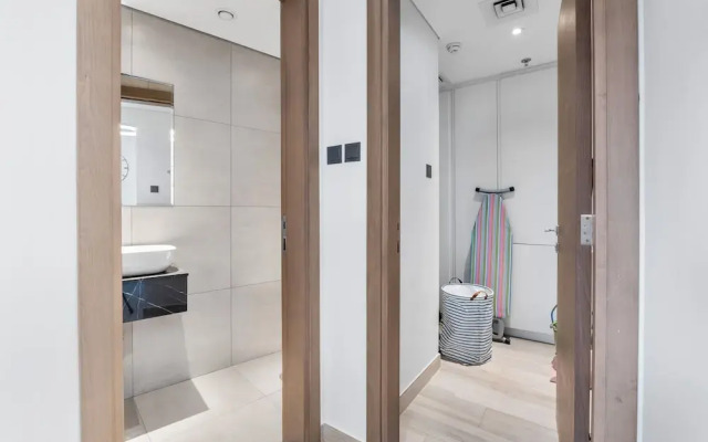 Waves - Stylish 1BR in JVC with Balcony & Pool