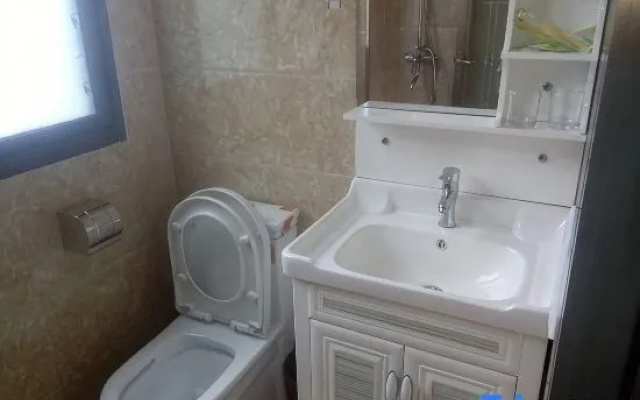 Lishui Ancient Village Xinyuan Homestay – Bathroom – Lishui