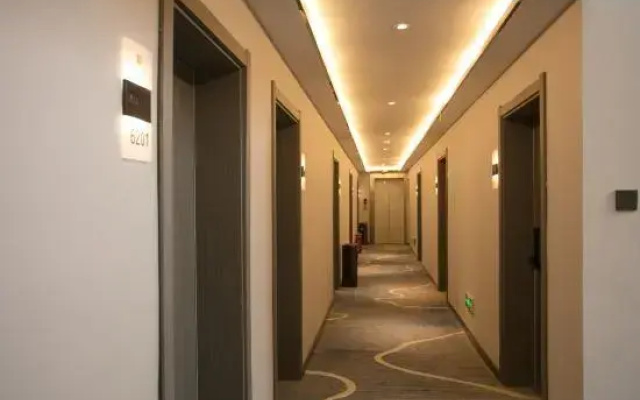 Home Inn Huaxuan Hotel Select (Zhoukou Taifuling Branch)