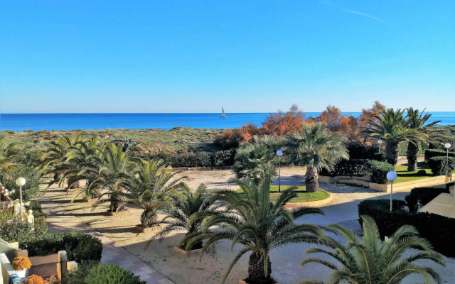 Residencial OlivalAcceso privado playa por jardín