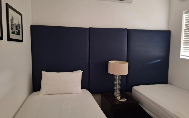 Genesis All-Suite Hotel