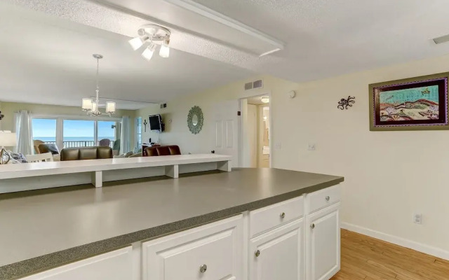 Oceanfront Beach Condo with Private Balcony, Short Walk to Pool and Beach by RedAwning