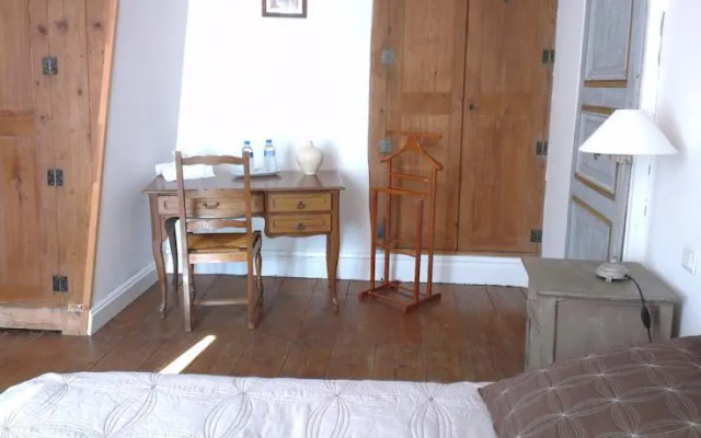 La Demeure du Gardien du Temps qui Passe