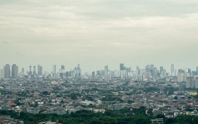 Cozy 1BR at Puri Orchard Apartment