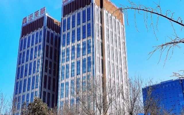 Xinzheng Xingangwanhua Hotel
