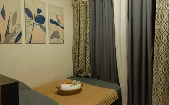 Cozy 1BR with balcony at Fame Residences