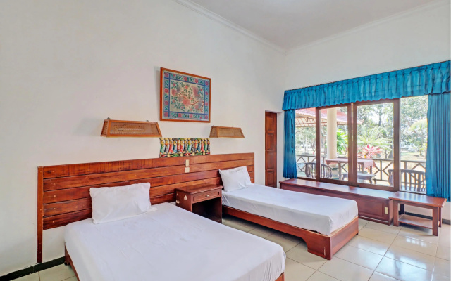 Capital O 93236 Hotel Hapel Negara – Guest Rooms – Baluk