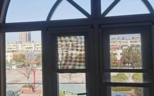 Yulian Tree Smart Hotel (Xinyang Railway Station Branch)