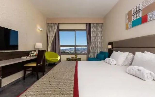 Ramada Olivie Nazareth