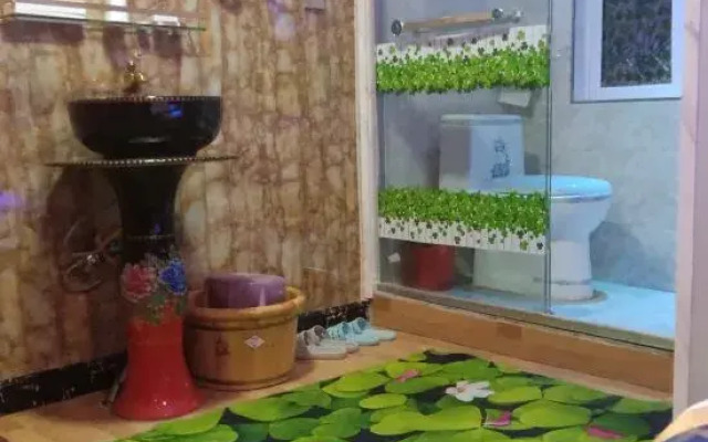 Wuchuan Aicheng Theme Apartment