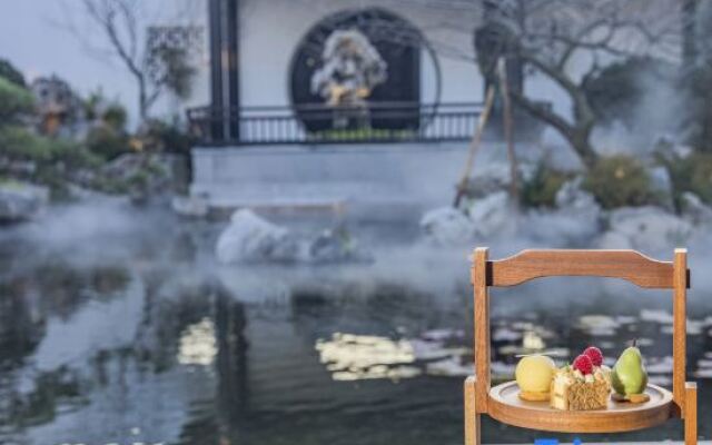 Zhoushan Green City Rose Garden Taoyuanli Hotel