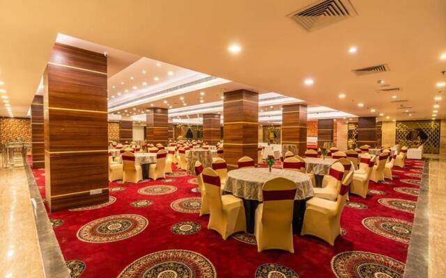 Divine Clarks Inn Suites