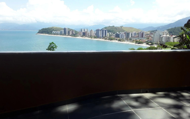 Honey Moon - Vista do mar na cama.