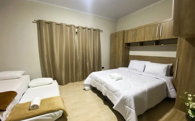 Casa Central piscina e AC para 8 hospede