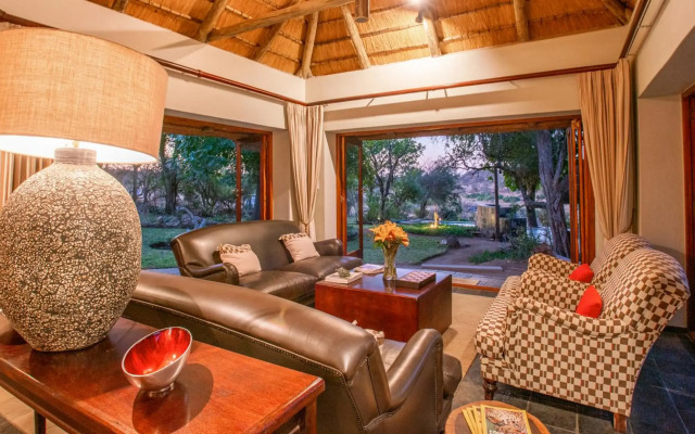 Ivory Wilderness River Rock Lodge