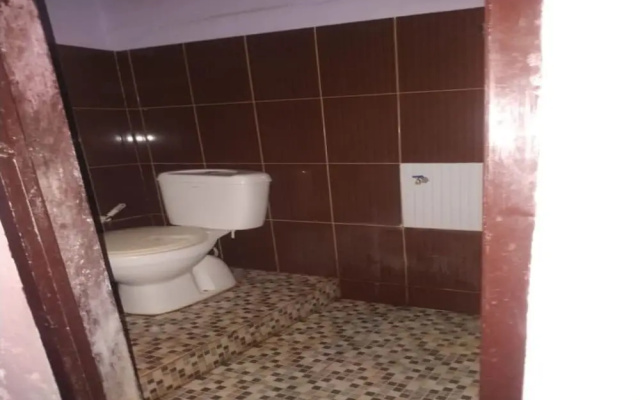 Hotel O Yellow White Guesthouse Palu