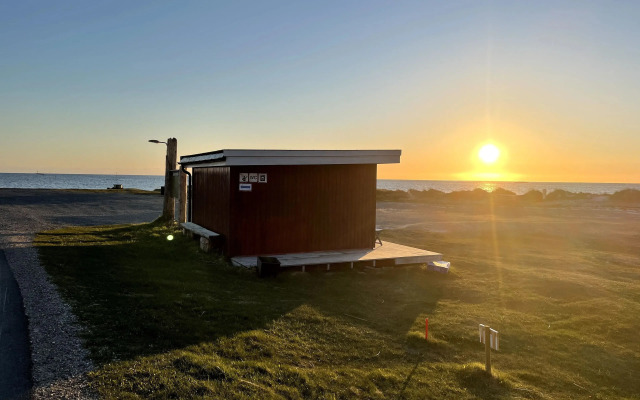 Midnattsol rom og hytter