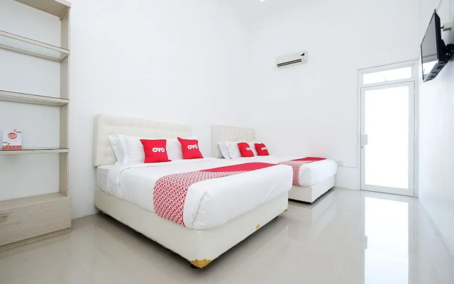 Capital O 1888 Griya RW Family Guest House