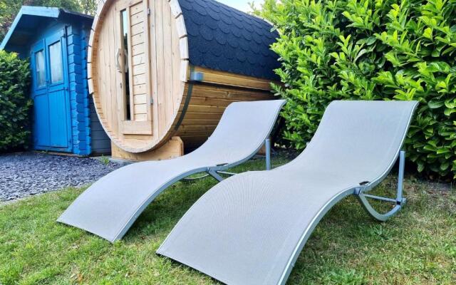 Ferienhaus "Ruhepol" im Ferienpark Extertal - Kamin, Fass-Sauna, Massagesessel