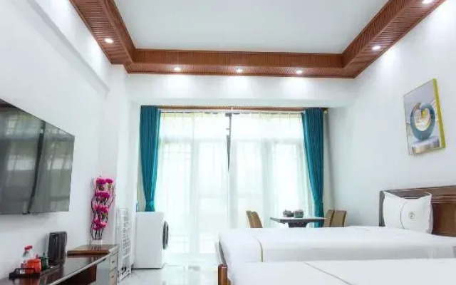 Jizhu Holiday Apartment (Menghai Mengbala Store)