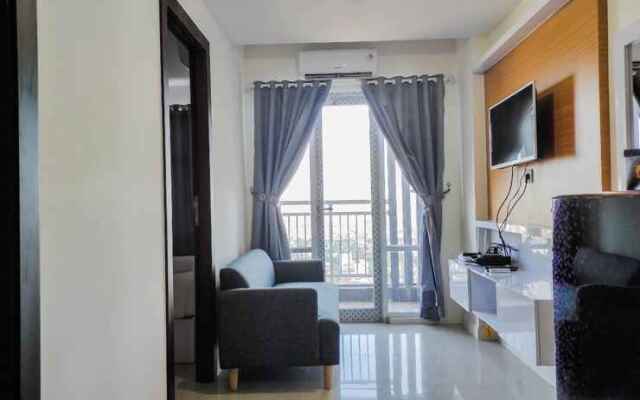 Comfy and Homey 2BR at Vida View Apartment By Travelio