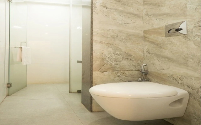 Super Townhouse OAK Regal Inn Near Sant Tukaram Nagar Metro Station