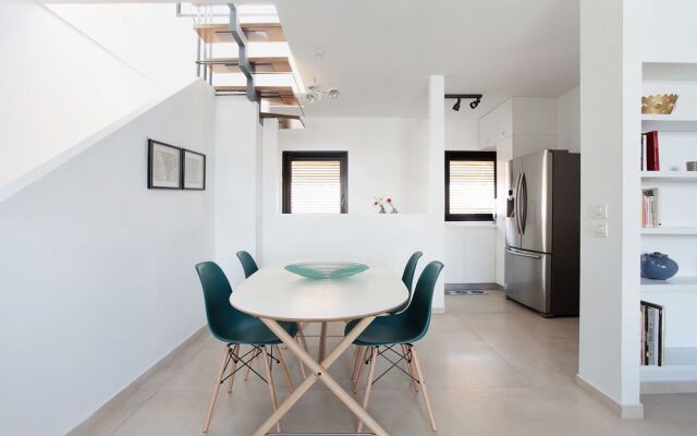 Chic Duplex Penthouse by FeelHome