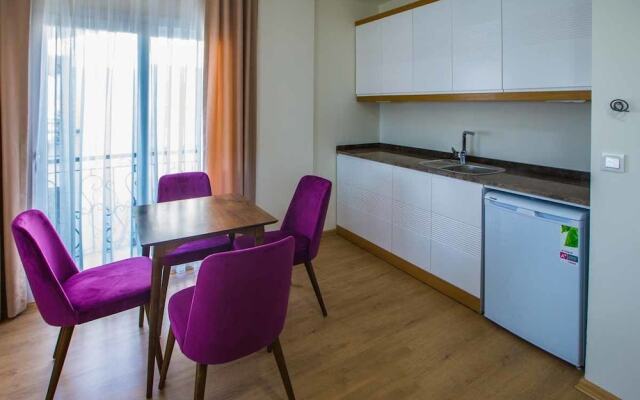 Clementine Suits Sigacik