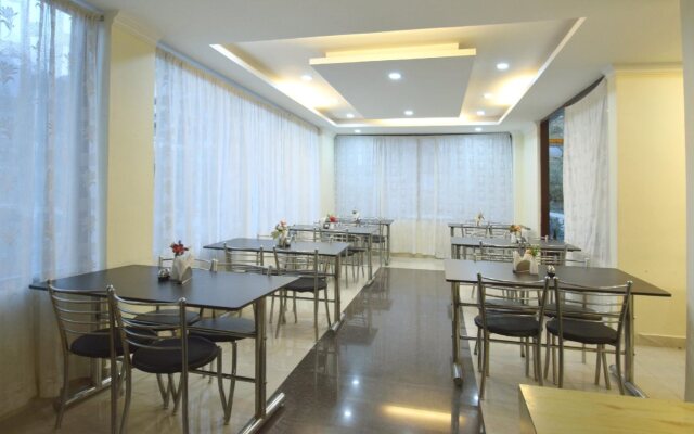 Hotel Asia Holidays by OYO Rooms