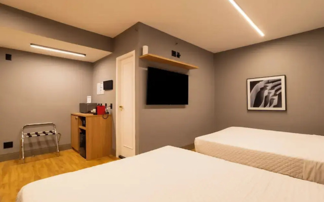 You Stay at Vila Olimpia - The World