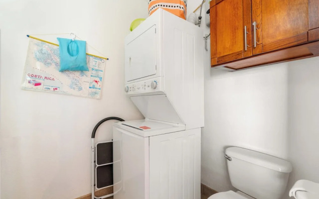 Modern Top-Floor Condo with Panoramic Views and Community Pool