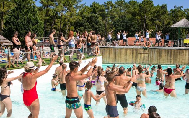 Cozy Mobile Home With Covered Terrace on a Luxury Campsite