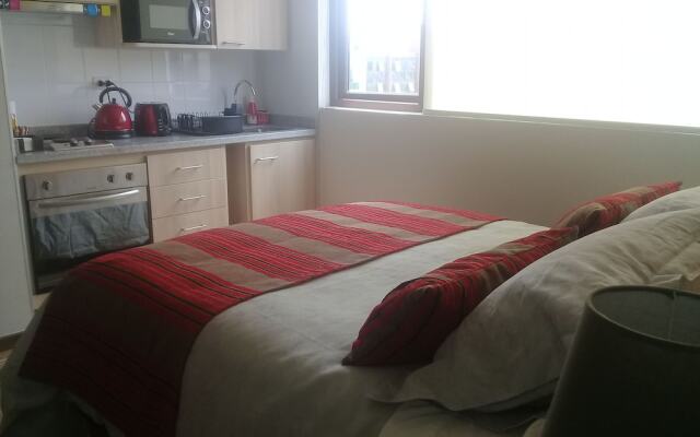 Plaza Parque Suites